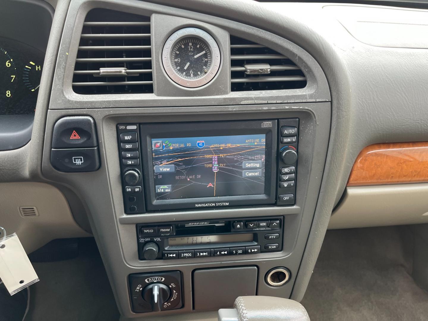 2003 tan /TAN Infiniti QX4 4WD (JNRDR09Y53W) with an 5 engine, 4-Speed Automatic Overdrive transmission, located at 14700 Tomball Parkway 249, Houston, TX, 77086, (281) 444-2200, 29.928619, -95.504074 - Photo#15